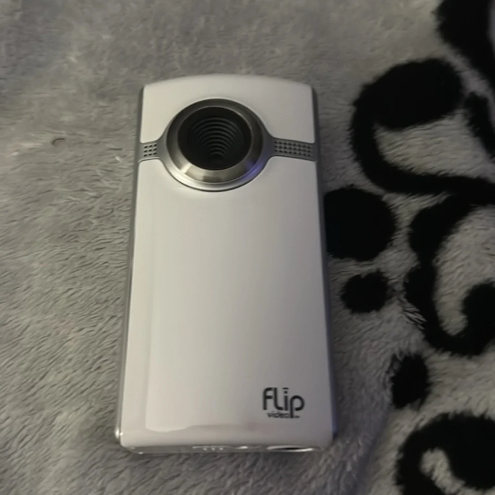 Flip Video Camera with Case, includes battery and battery charger! Like new